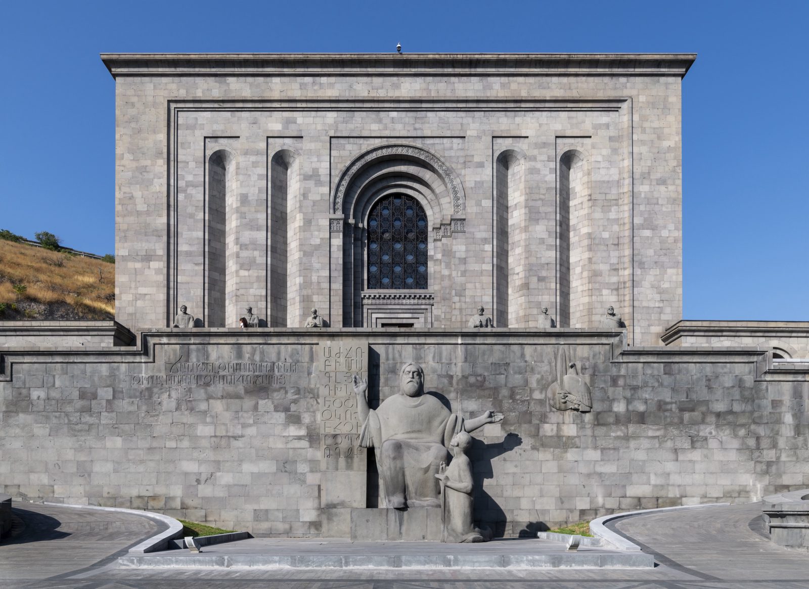 Front view of the Matenadaran in Yerevan with the Mesrop Mashtots monument below