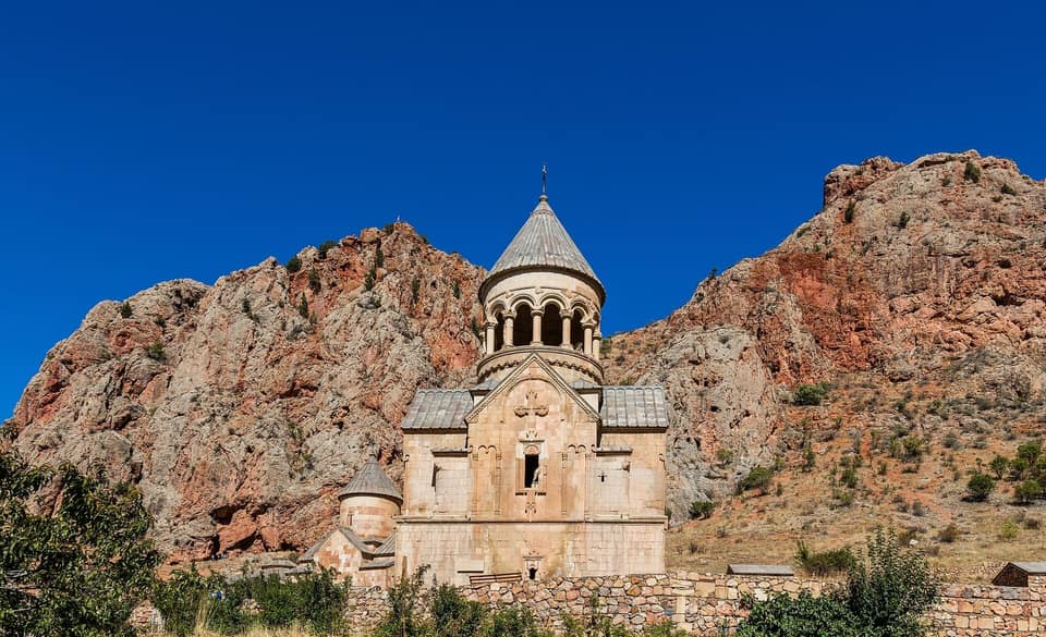 Noravank Monastery against the red cliffs of its gorge